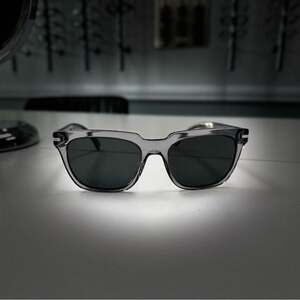 Stylish Prada translucent grey poalarized sunglasses